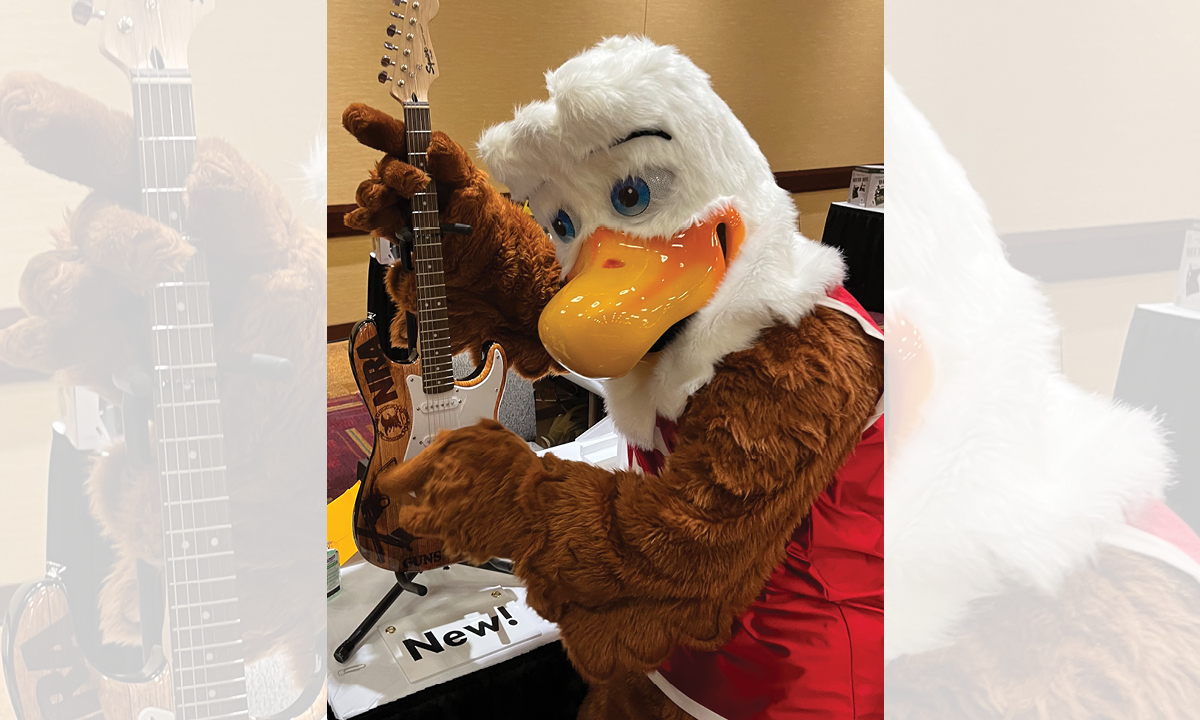 Eddie Eagle shreds his solo at the NRAstore on their new limited edition NRA guitar.