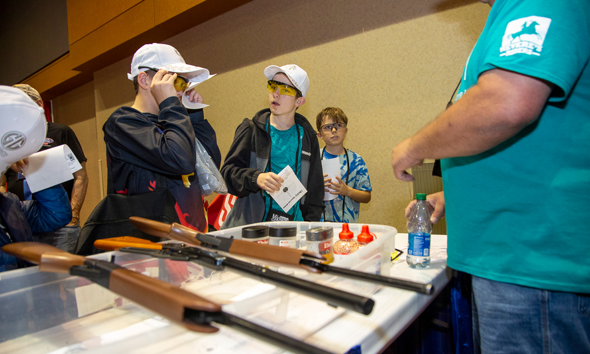 Kids test their accuracy at NRA Youth Day's BB range